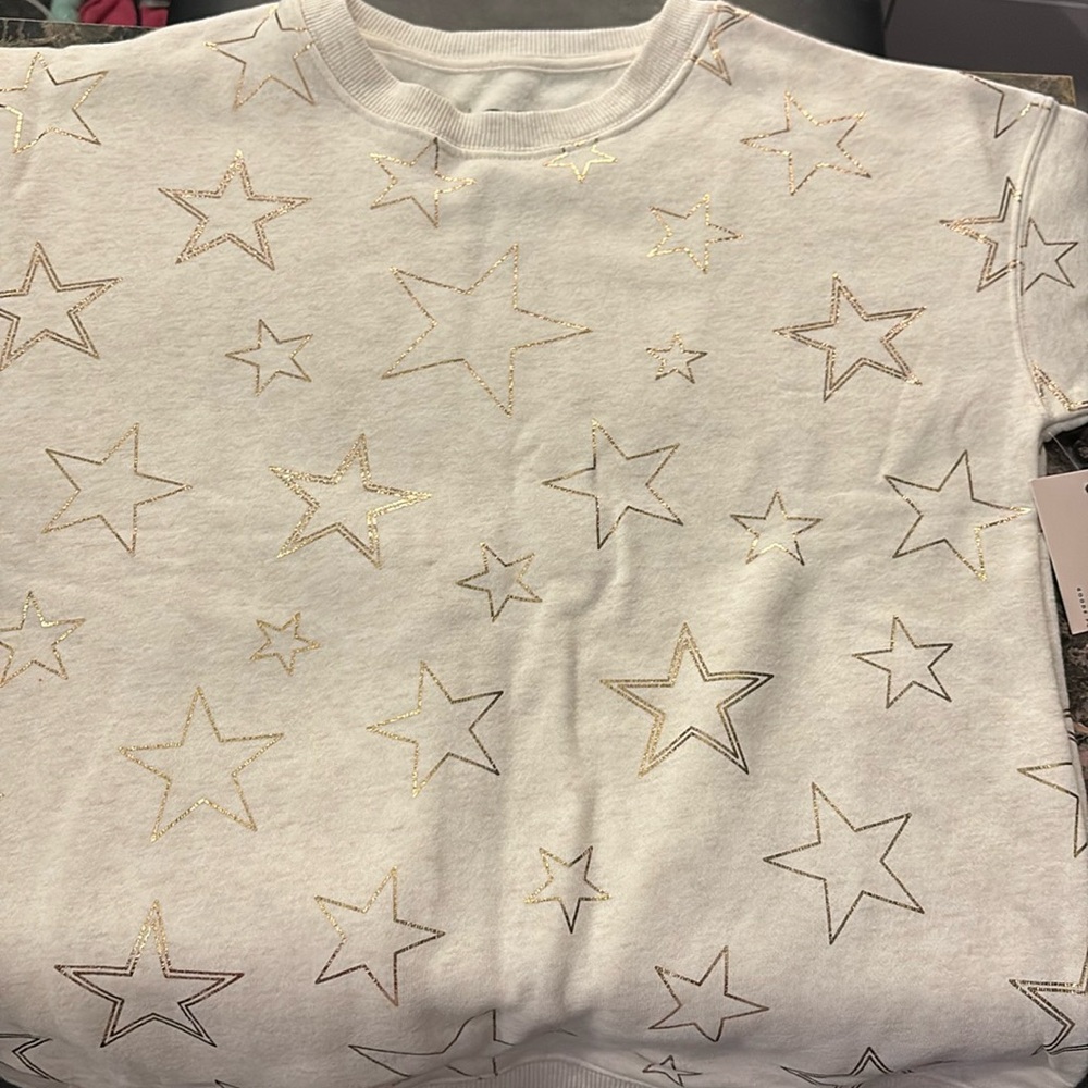 Beige sweater with gold stars
